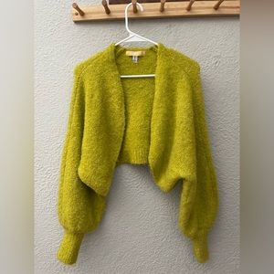 Urban Outfitters bright green cropped cardigan.